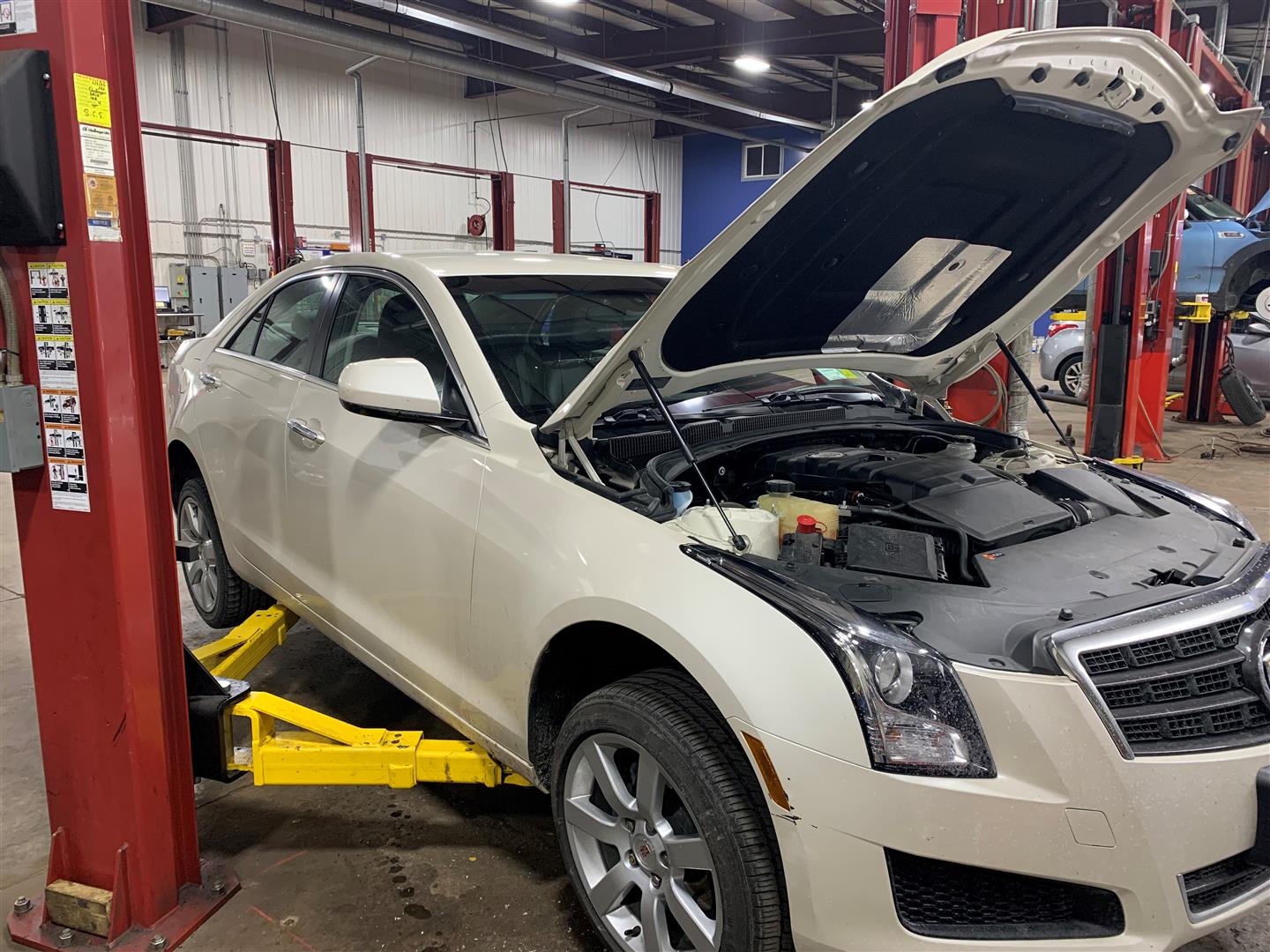 Cadillac Vehicle Inspection | Lou's Car Care Center, Inc.